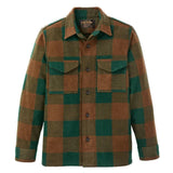 Orange and green plaid wool shirt on a flat white background