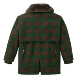 Backside view of a green and brown plaid wool coat with a brown fur collar