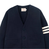 Navy blazer with a brand label on a light gray background