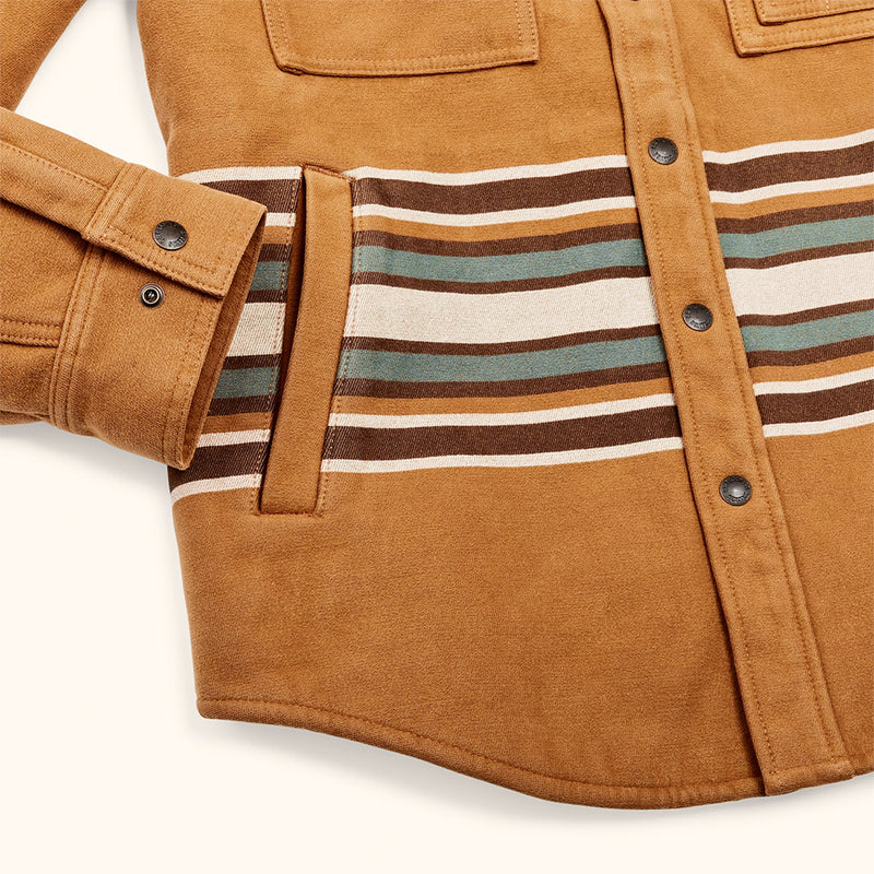 "the cuffs and hip pockets soft heavy blanket shirt in golden brown with multi color horizontal stripes across stomach area"