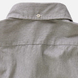 Close-up of a gray striped shirt collar with a button.