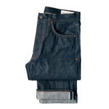 Dark indigo jeans on a white background