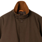 Close up of upper portion of coat with the collar upturned