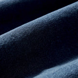 close up picture of denim texture and color. rinsed indigo fabric.