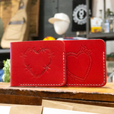 Two variations of Red Leather Bifold wallets