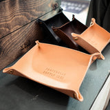 large valet tray and small valet trays