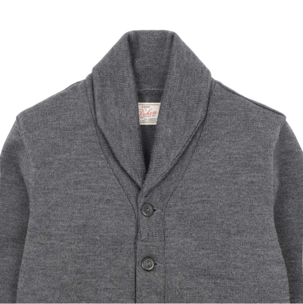 Gray cardigan with a brand label on a white background