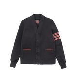 Black cardigan with red accents on sleeves and buttons on a white background