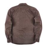View of the backside of a brown utility shirt on a flat white background