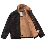 Black canvas coat with tan fur collar and inner lining on a flat white background