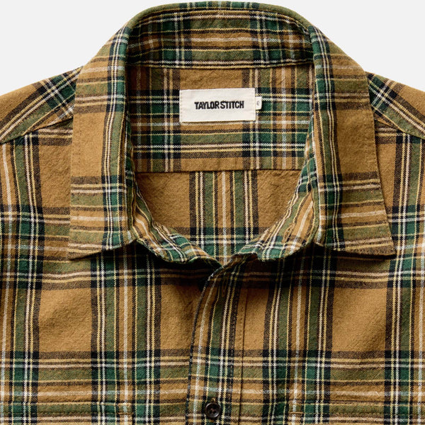 Plaid shirt with collar and Taylor Stitch label on a white background