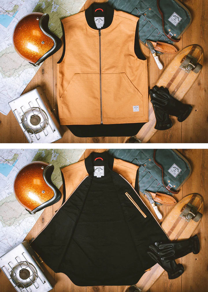 Highway Vest in Cognac surrounded by stove, helmet, toolbag, and gloves