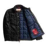 Black puffy jacket unbuttoned to reveal a navy blue inner lining on a flat white background