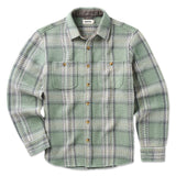 Green plaid shirt with button details on a white background