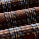 Close-up of brown and blue plaid fabric