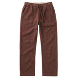 Front of a pair of straight leg draw string pants in a textured burgundy fabric with two fatigue style hand pockets