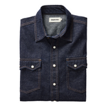 "taylor stitch western style frontier shirt rinsed indigo denim pearl snap buttons folded"