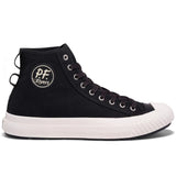 Side profile of black canvas high-top sneakers with black laces, silver grommets, and white rubber sidewalls and toe cap. There is a black circular patch on the side of the ankle with white text reading [P.F. Flyers]