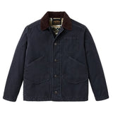Front of navy canvas jacket with dark brown corduroy collar, dark buttons going down the center of the jacket, a chest pocket on the right side, and hand/cargo flap pockets.