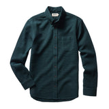 "Long sleeved Forest green collared shirt with brown buttons"
