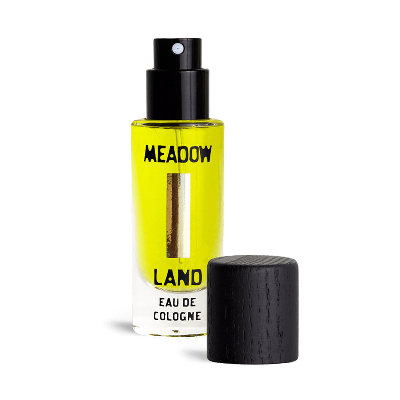 Bottle of Meadowland cologne with cap off