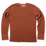 Front of rust red long-sleeved waffle thermal shirt