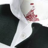Close up of hidden placket on a white and dark green striped rugby polo with white rubber buttons