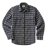 Front of white, black, and dark navy plaid long sleeved button up shirt