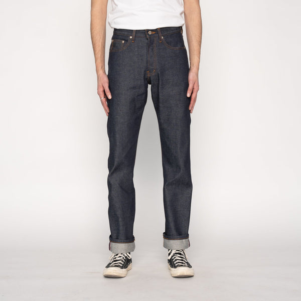 Model wearing the Naked and Famous Dirty Fade Selvedge Denim in True Guy fit